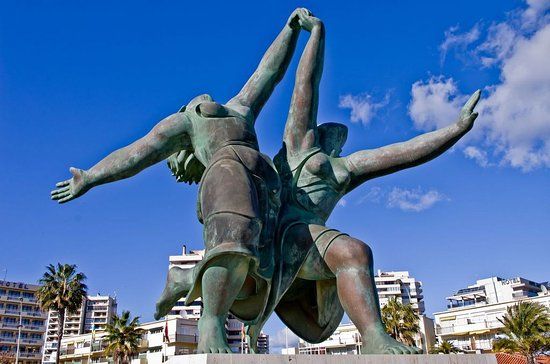 Mujeres Corriendo por la Playa
